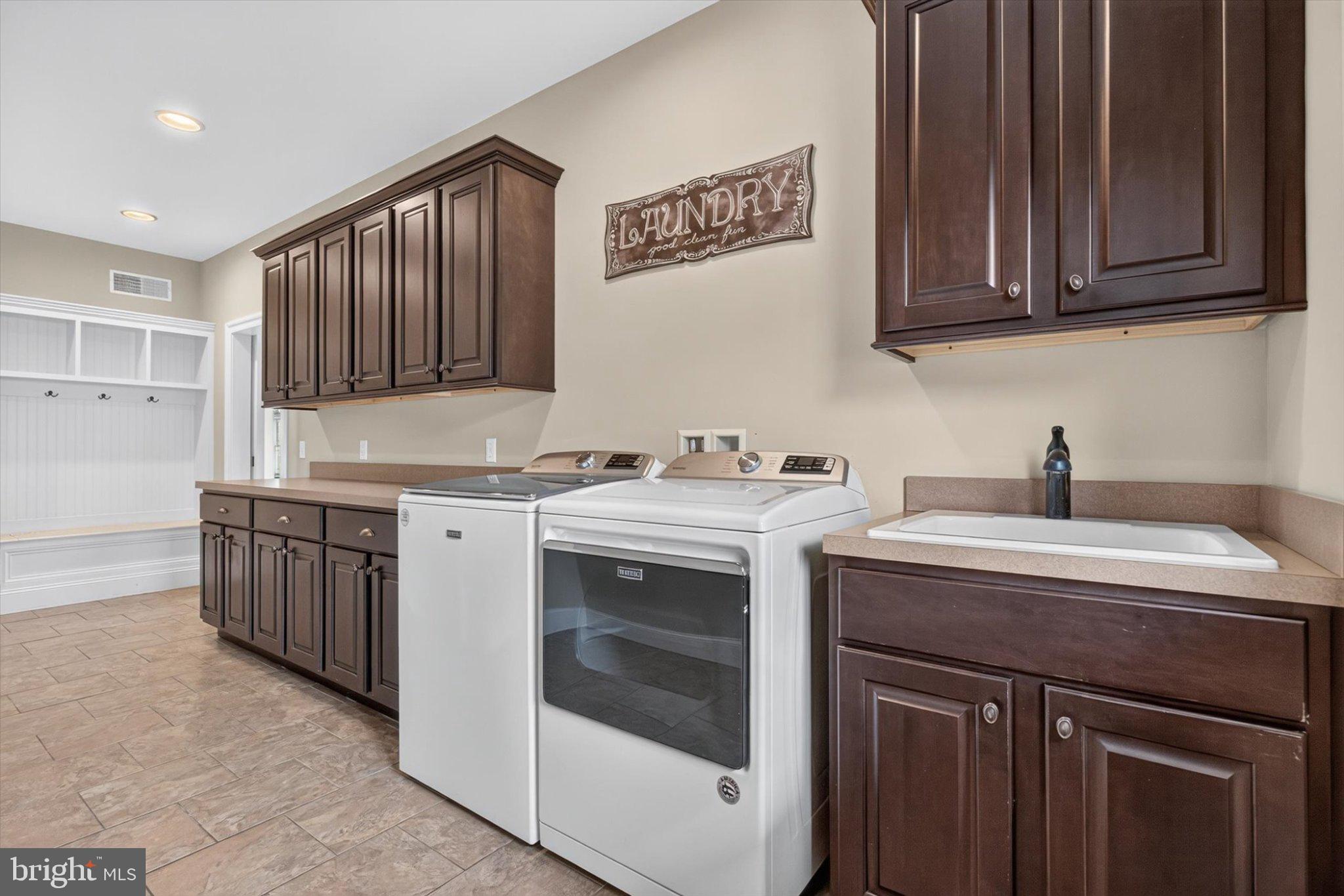 6505 Plowman Ridge Harrisburg, PA 17112 - Photo 24 of 83 Stylish laundry room with ample storage.
