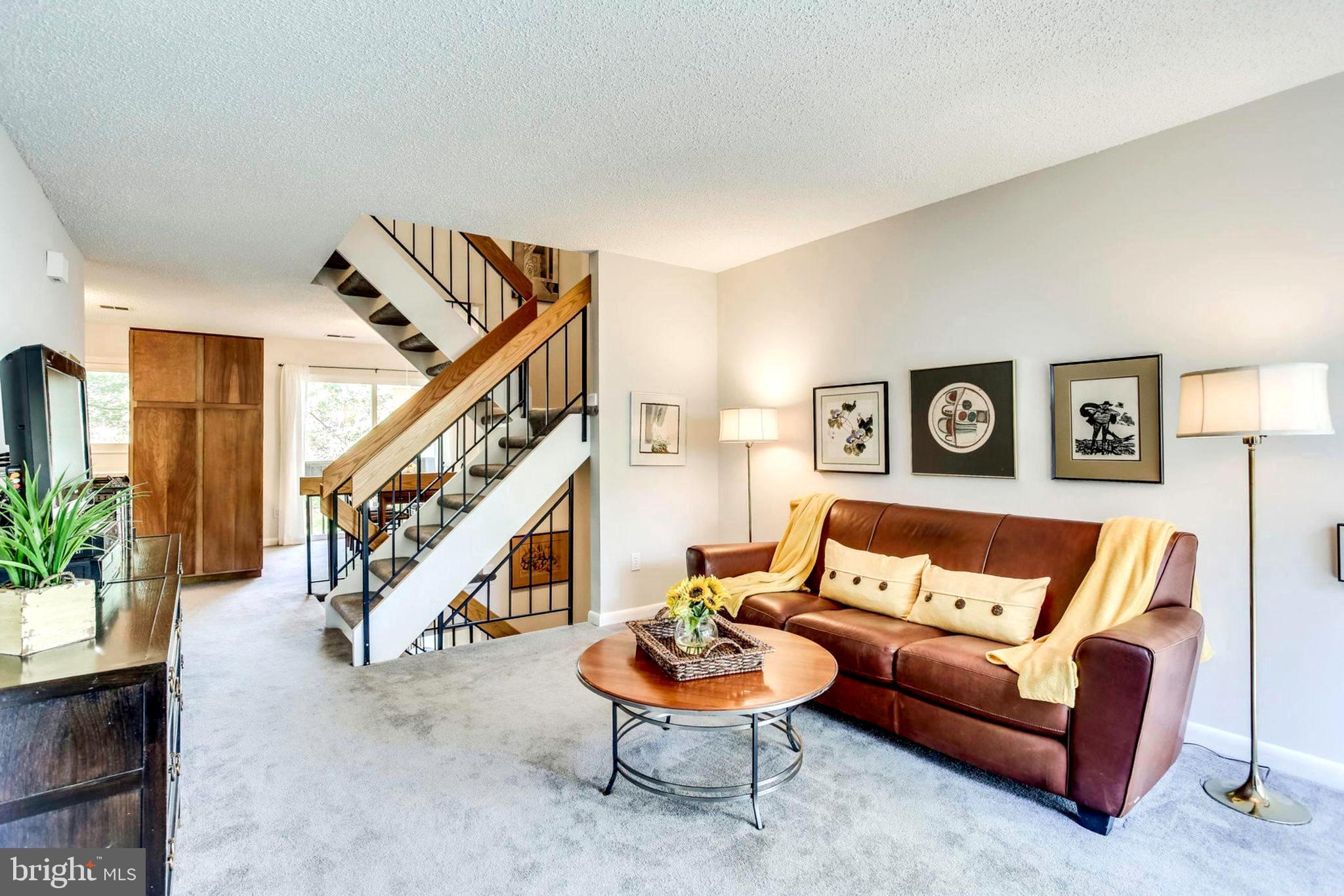 2239 Southgate Square Reston, VA 20191 - Photo 1 of 50 Spacious living room is perfect for entertaining