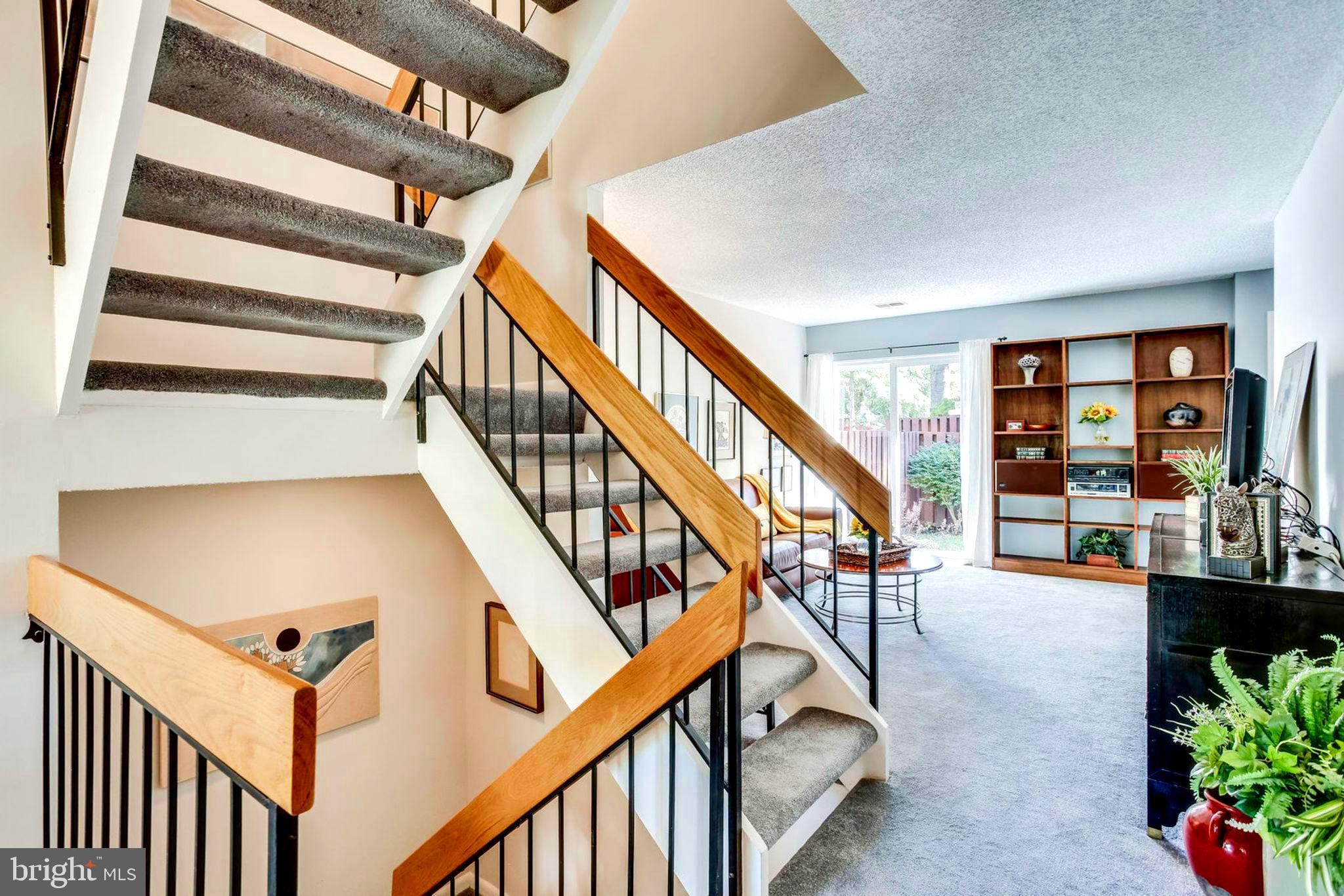 2239 Southgate Square Reston, VA 20191 - Photo 10 of 50 Open stairs up to second level