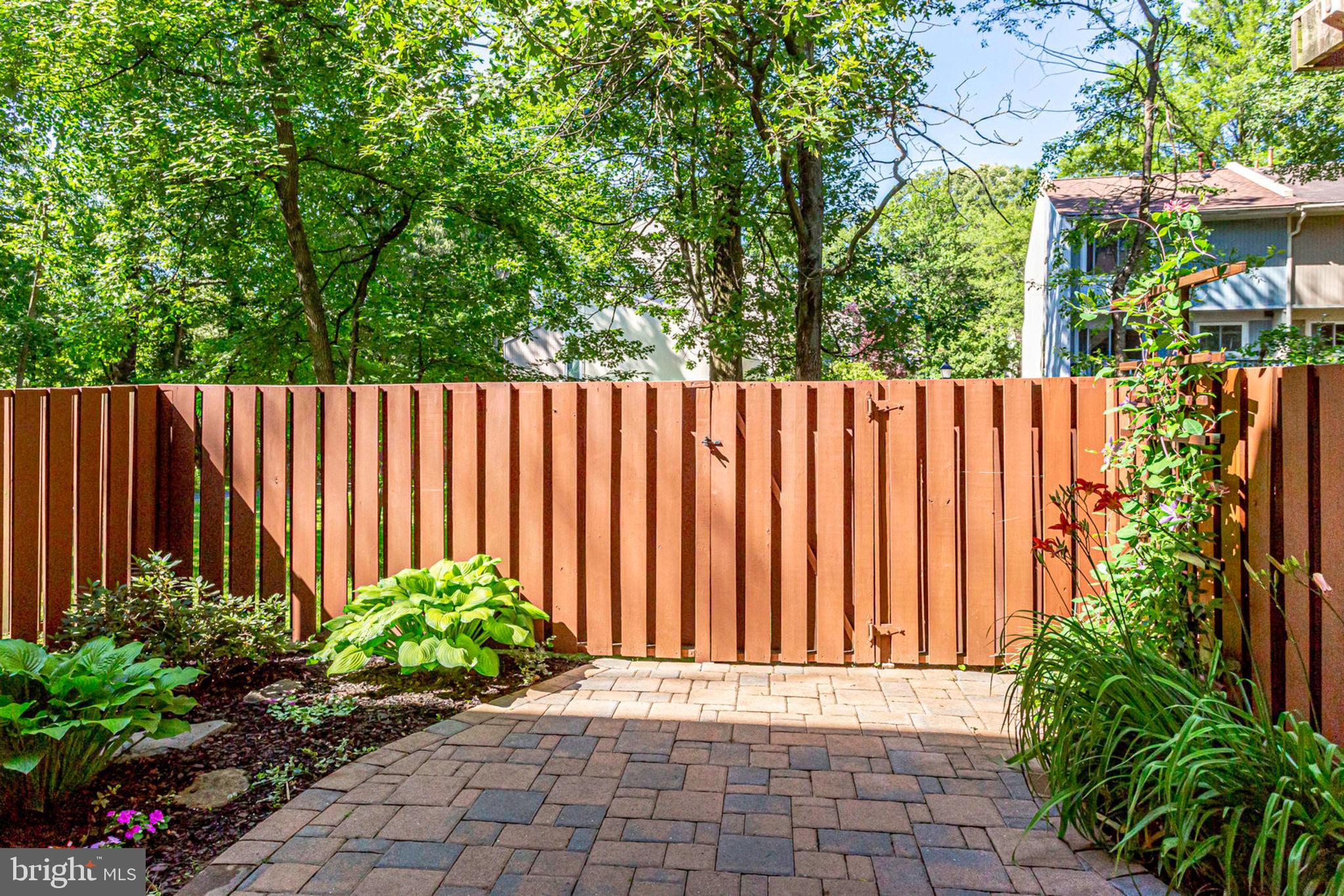 2239 Southgate Square Reston, VA 20191 - Photo 24 of 50 Common area beyond patio adds more greenery