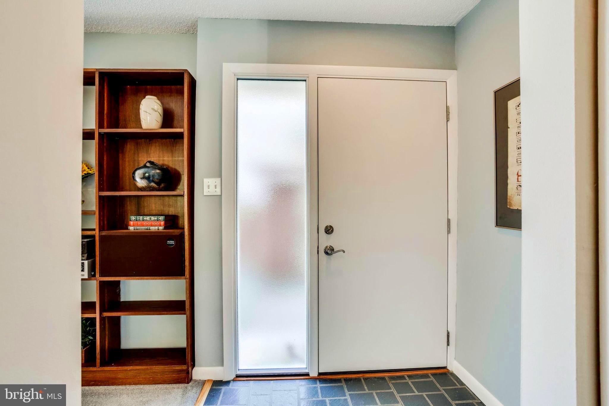 2239 Southgate Square Reston, VA 20191 - Photo 34 of 50 Frosted glass allows light and privacy at entry