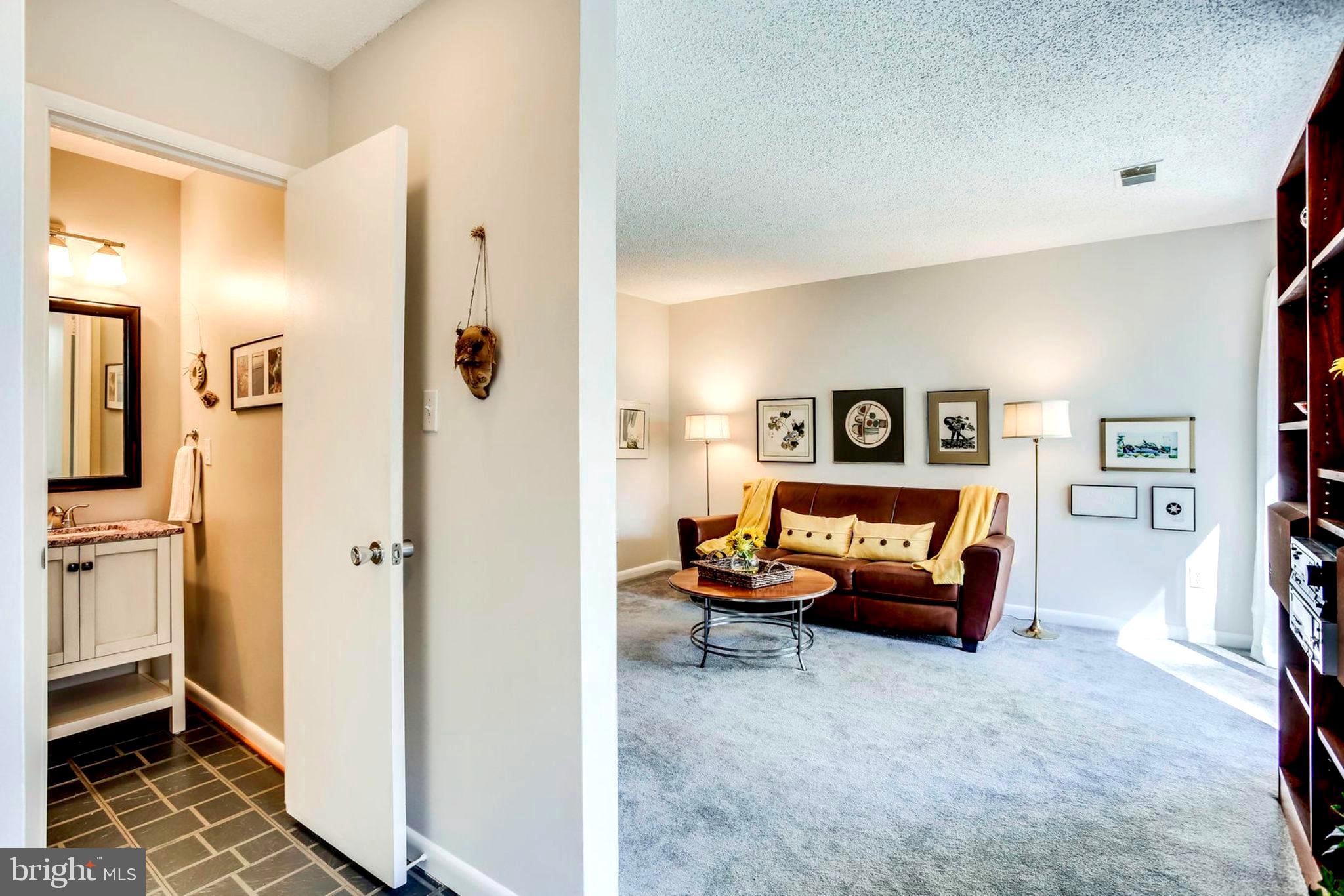 2239 Southgate Square Reston, VA 20191 - Photo 35 of 50 Foyer leads to LR & to coat closet & powder room