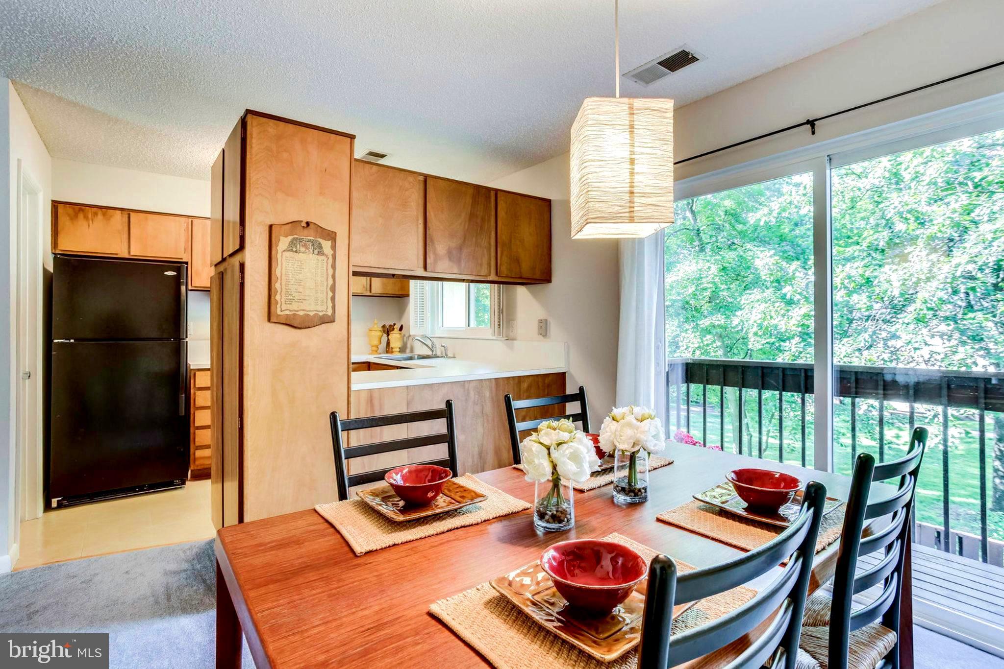 2239 Southgate Square Reston, VA 20191 - Photo 7 of 50 Lots more light provided by glass doors to deck
