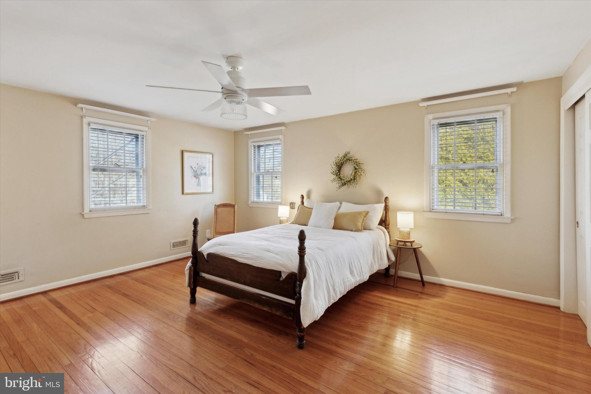 629 Colonel Dewees Road Wayne, PA 19087 - Photo 18 of 34 a bedroom with a bed lamp closet and window