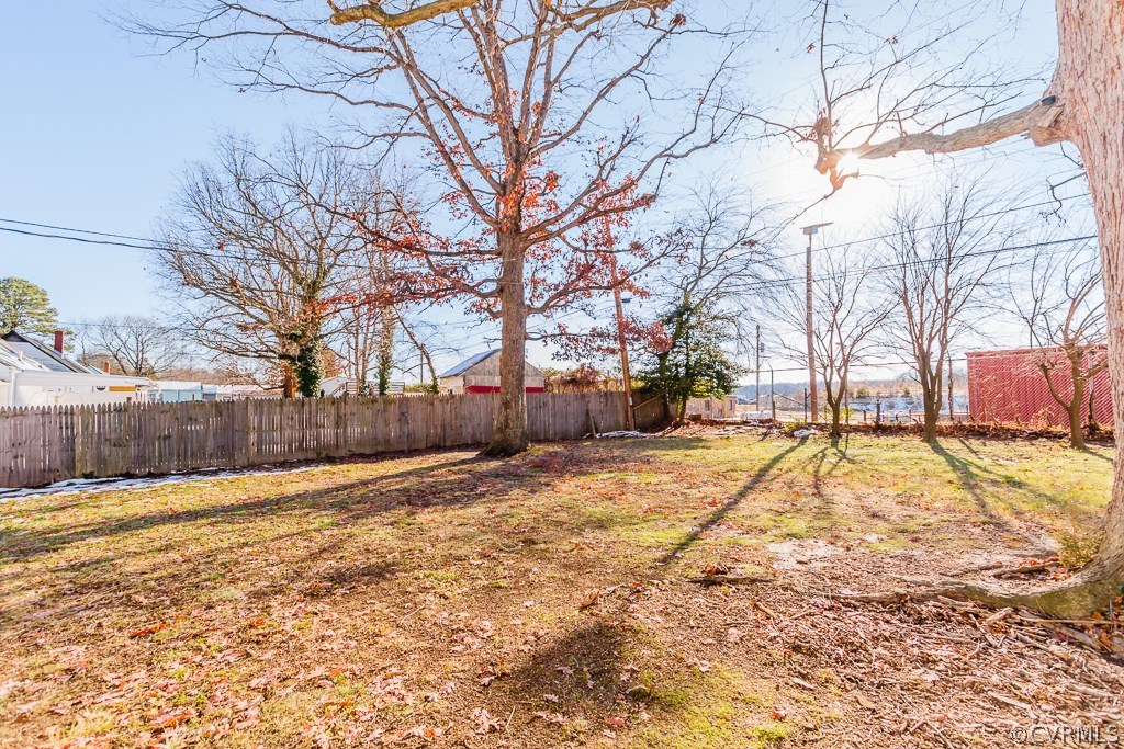 6752 Strathmore Road Richmond, VA 23237 - Photo 29 of 33 Big flat backyard that is partially fenced in and