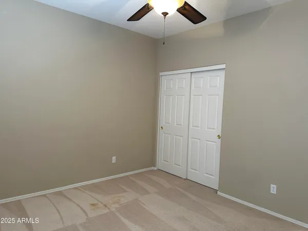 a kitchen with stainless steel appliances granite countertop a refrigerator a stove a sink and a oven