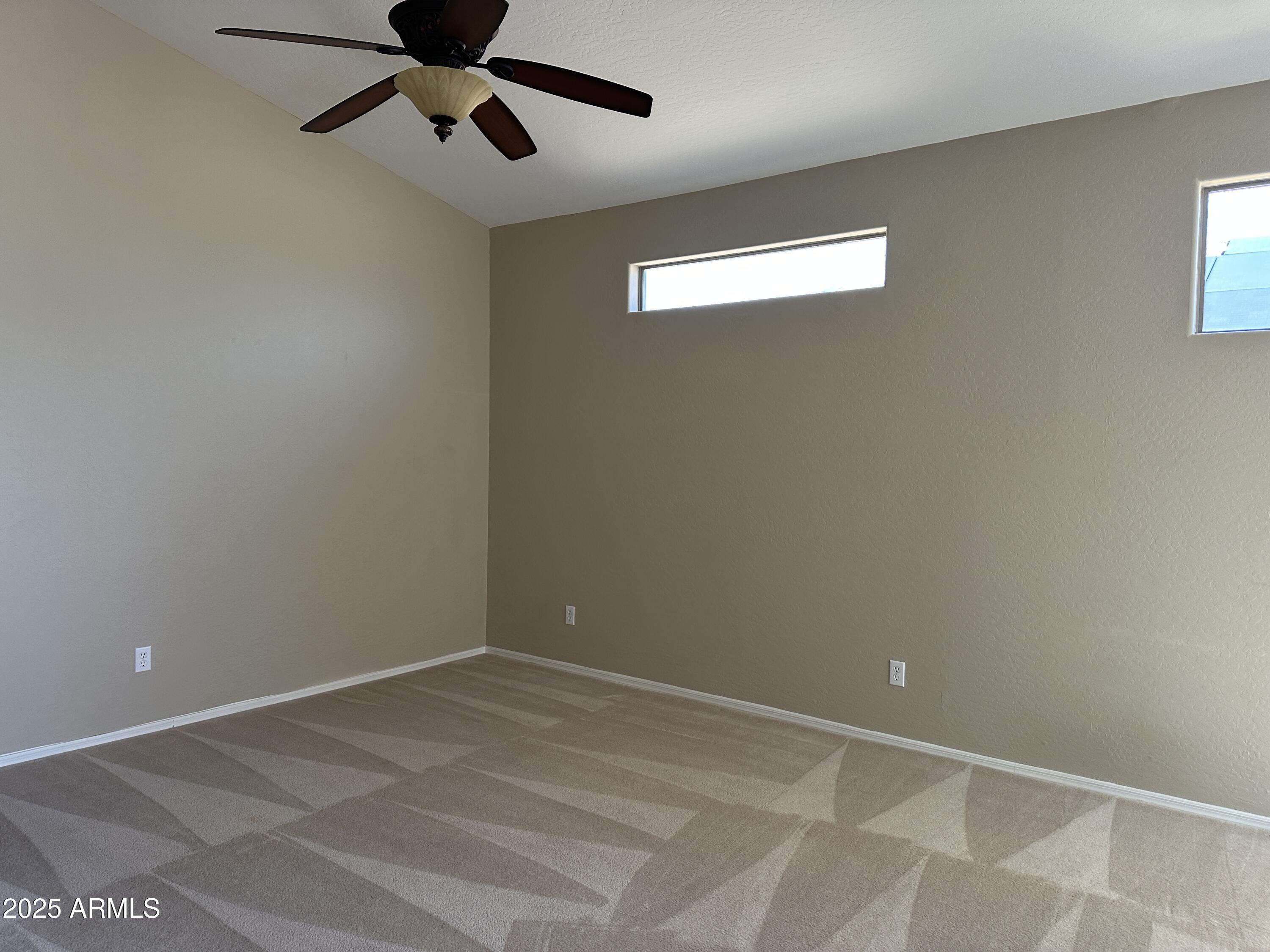 10460 South 182nd Drive Goodyear, AZ 85338 - Photo 5 of 33 a view of an empty room