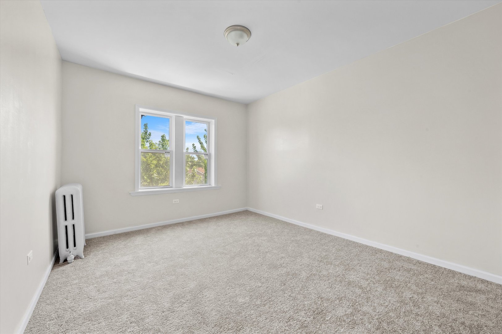 3349 West 21st Street Chicago, IL 60623 - Photo 11 of 14 an empty room with windows