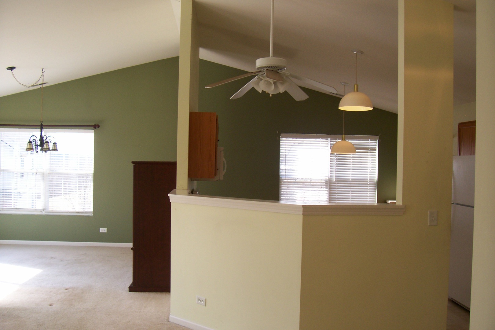 523 North Red Deer Road Round Lake, IL 60073 - Photo 4 of 14 a view of a livingroom with a ceiling fan and a window