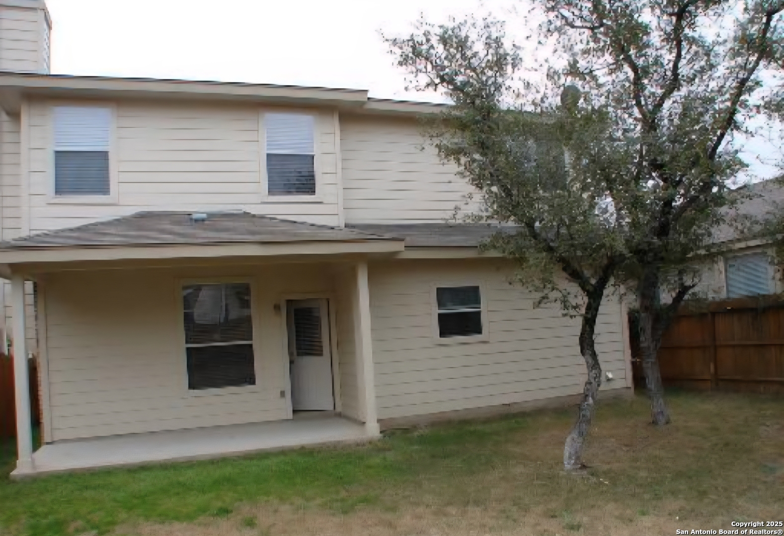 9019 Burnt Peak Helotes, TX 78023 - Photo 8 of 11 a view of backyard of house