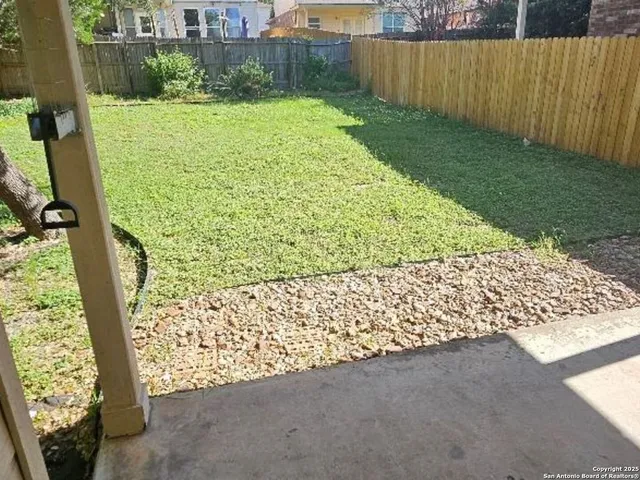 a view of a garden with an empty space