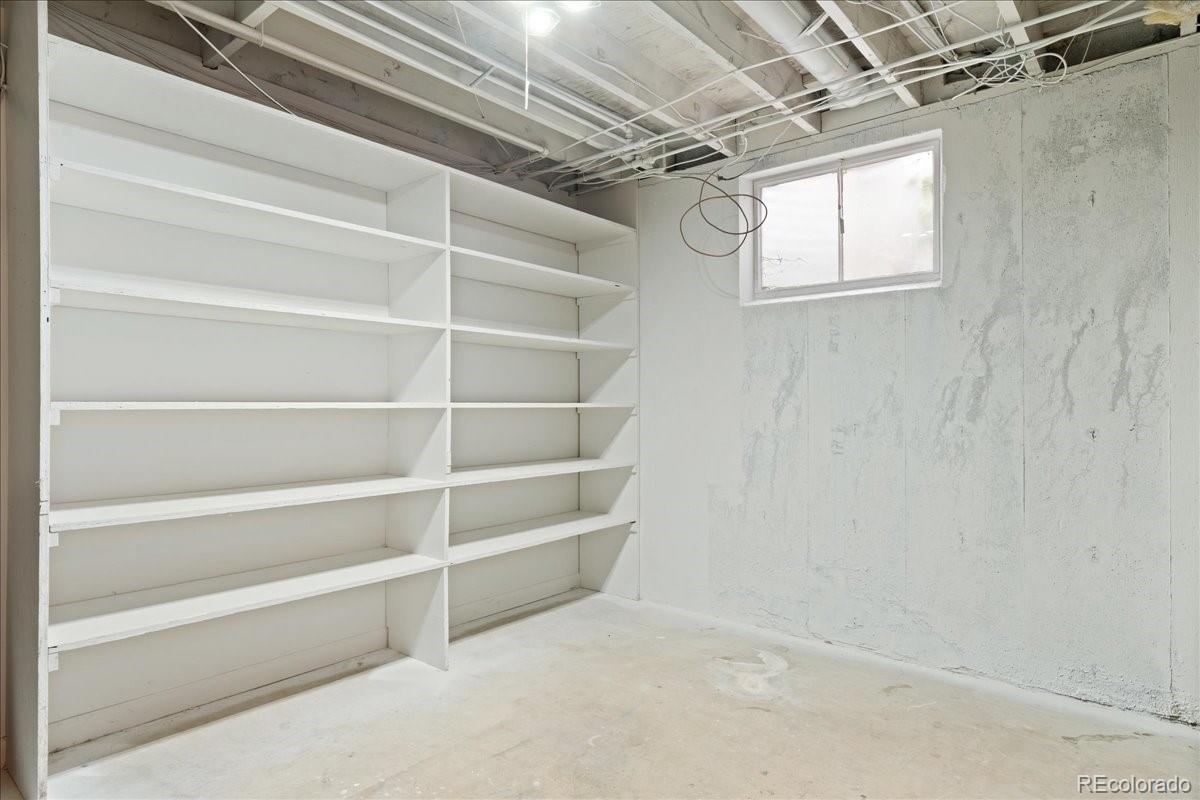 2597 South Perry Street Denver, CO 80219 - Photo 23 of 33 a view of an empty room with empty racks