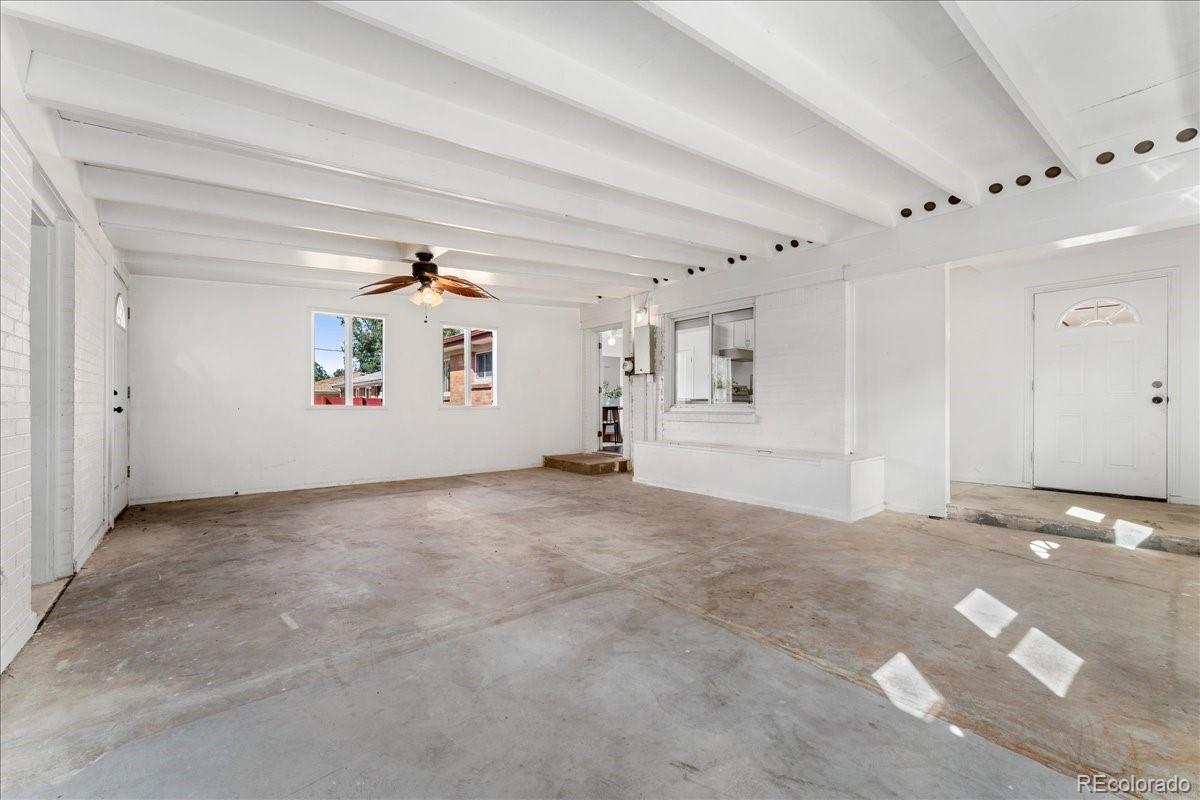 2597 South Perry Street Denver, CO 80219 - Photo 25 of 33 a view of a big room with closet and windows