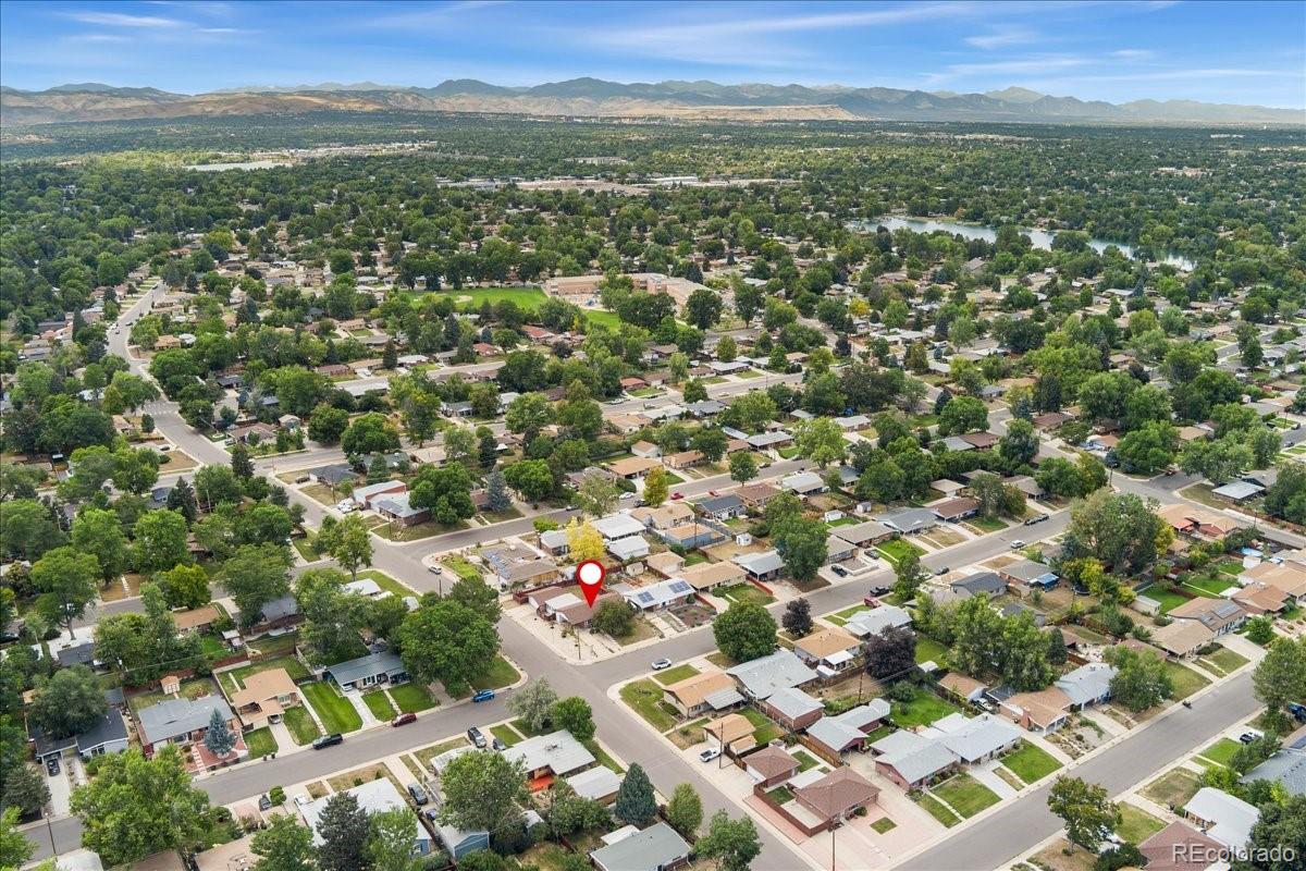 2597 South Perry Street Denver, CO 80219 - Photo 31 of 33 an aerial view of residential houses with city view and lake view
