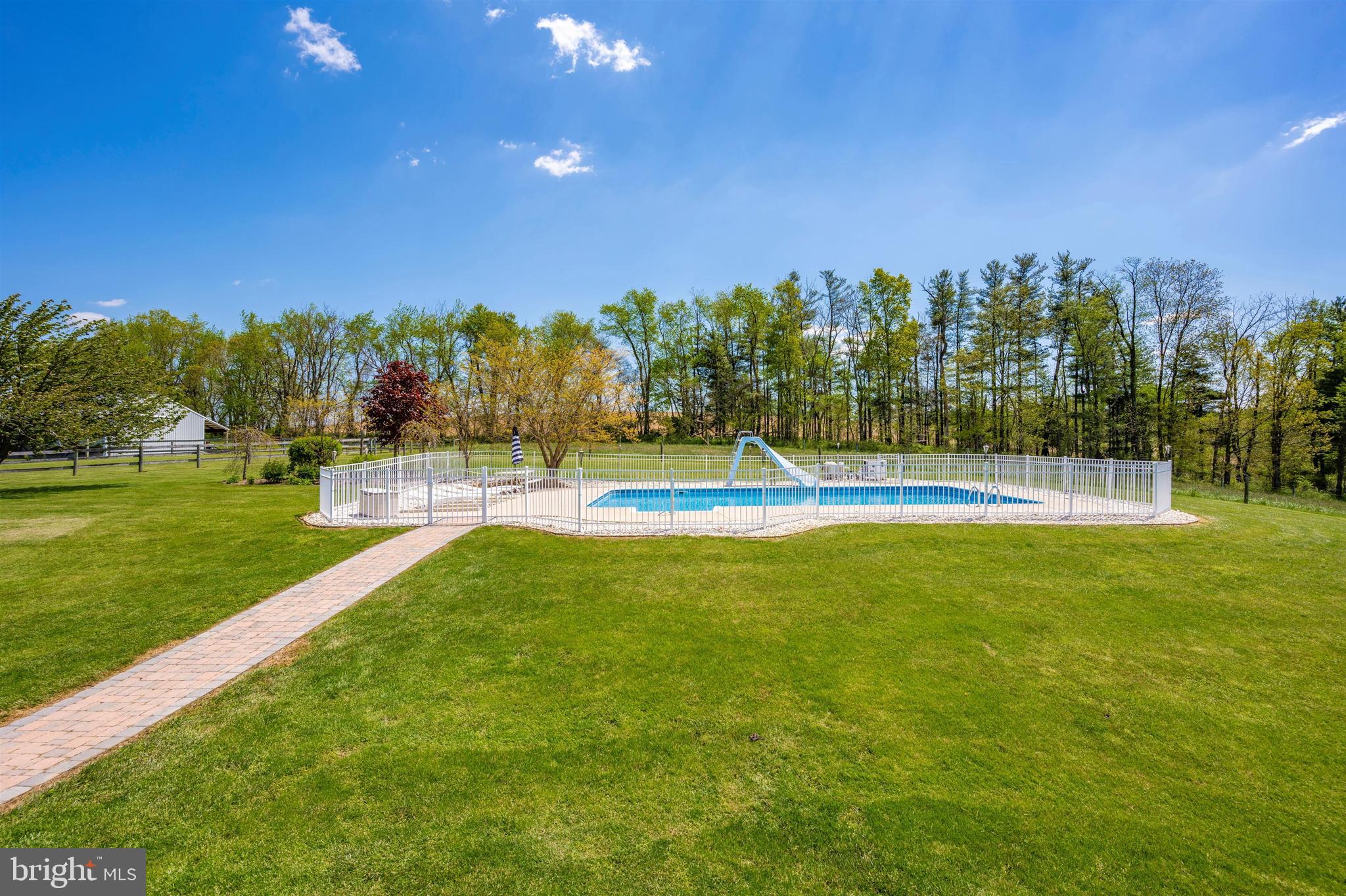 7779 Dollyhyde Road Mount Airy, MD 21771 - Photo 40 of 84 Brick walkway to private in-ground pool.