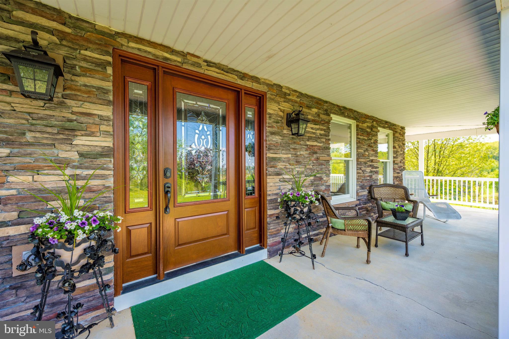 7779 Dollyhyde Road Mount Airy, MD 21771 - Photo 5 of 84 Inviting wrap around porch with stone front.