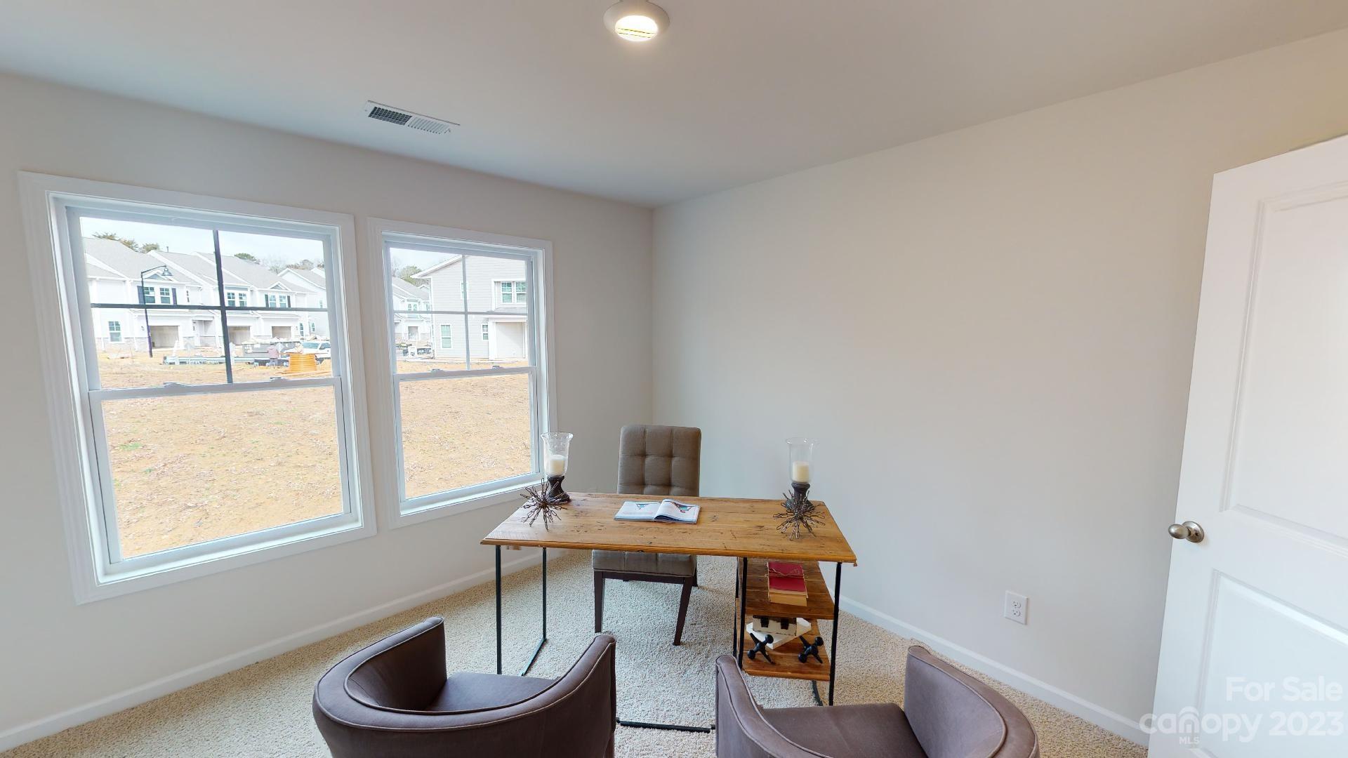 44 Ravens Rdg Road Hendersonville, NC 28792 - Photo 34 of 38 a workspace with furniture and window