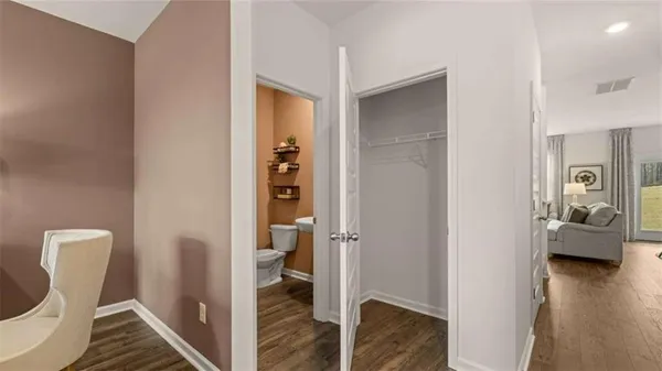 a view of hallway with livingroom and bedroom