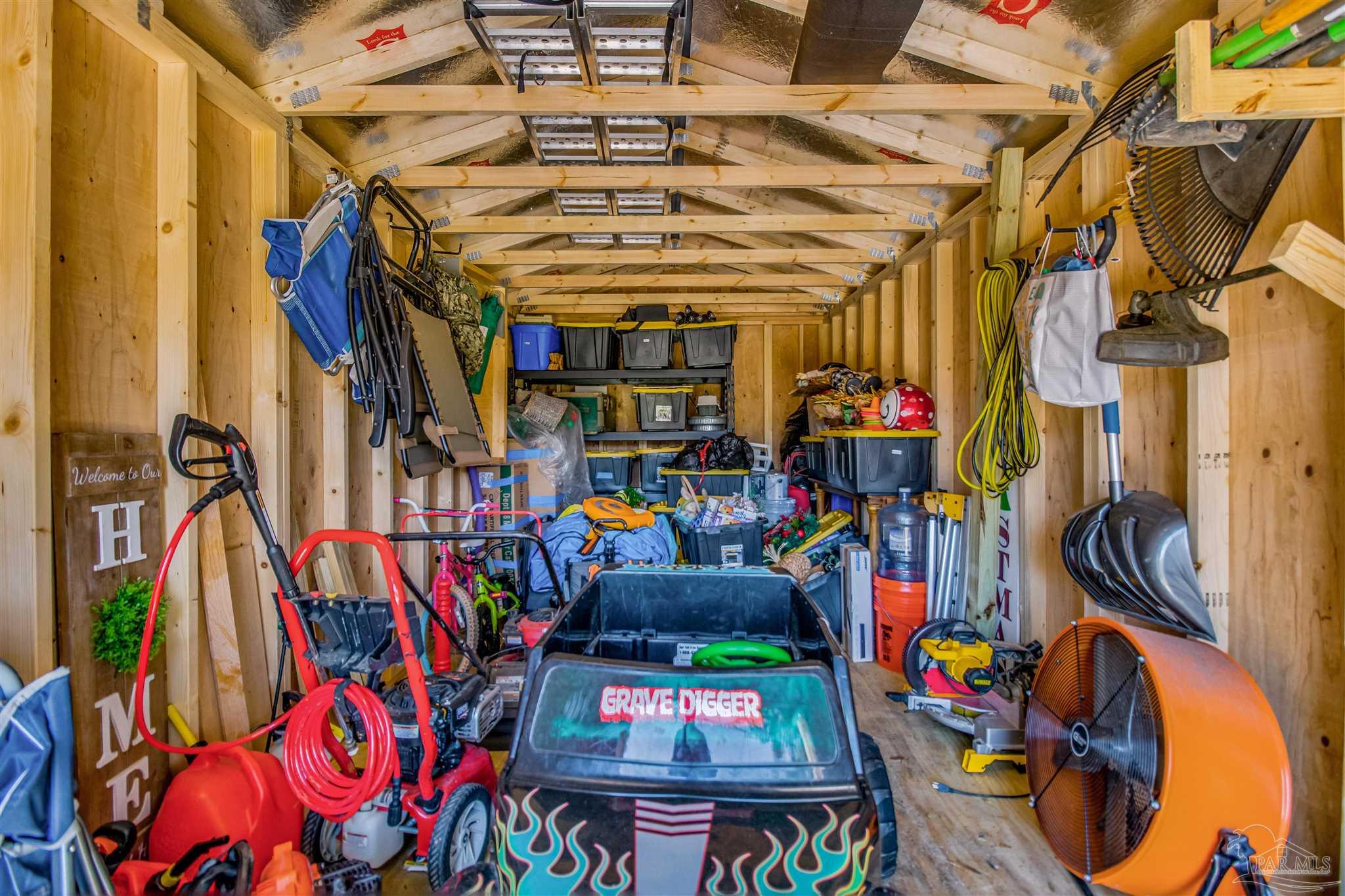 8024 Silver Maple Drive Milton, FL 32583 - Photo 40 of 43 a view of storage and utility room