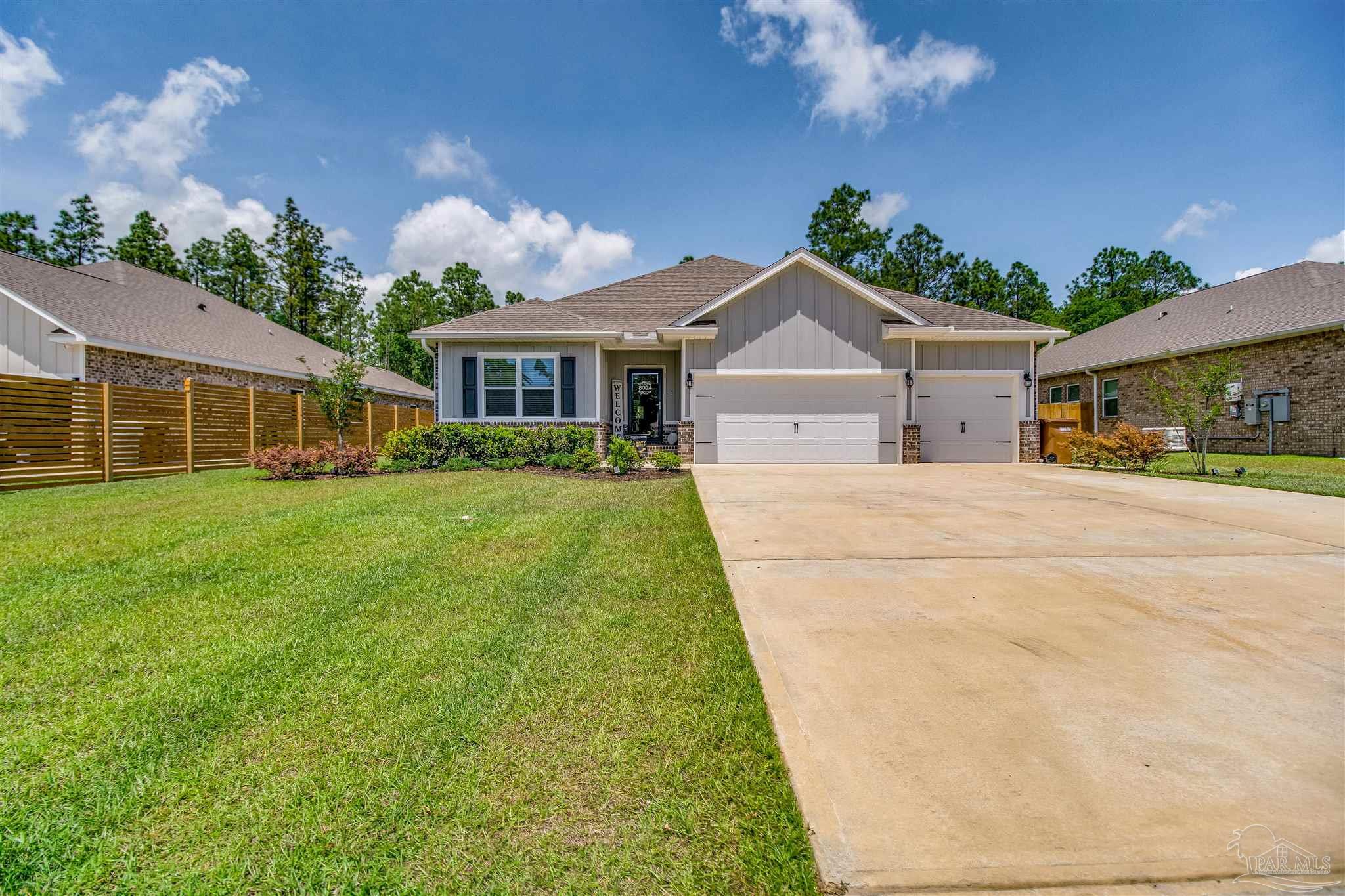 8024 Silver Maple Drive Milton, FL 32583 - Photo 41 of 43 a view of house with yard