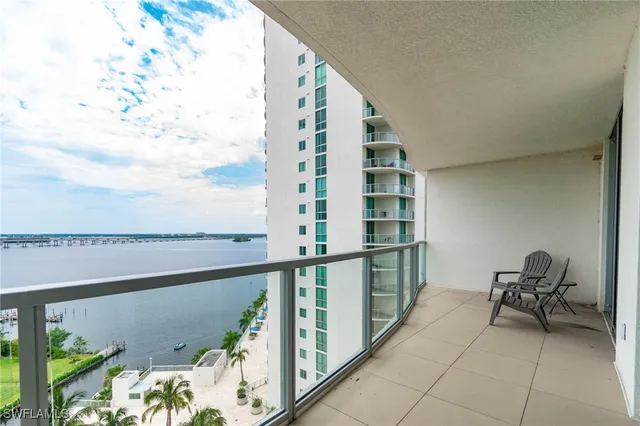 a view of balcony with furniture