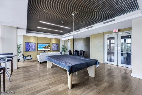 a room with furniture and wooden floor