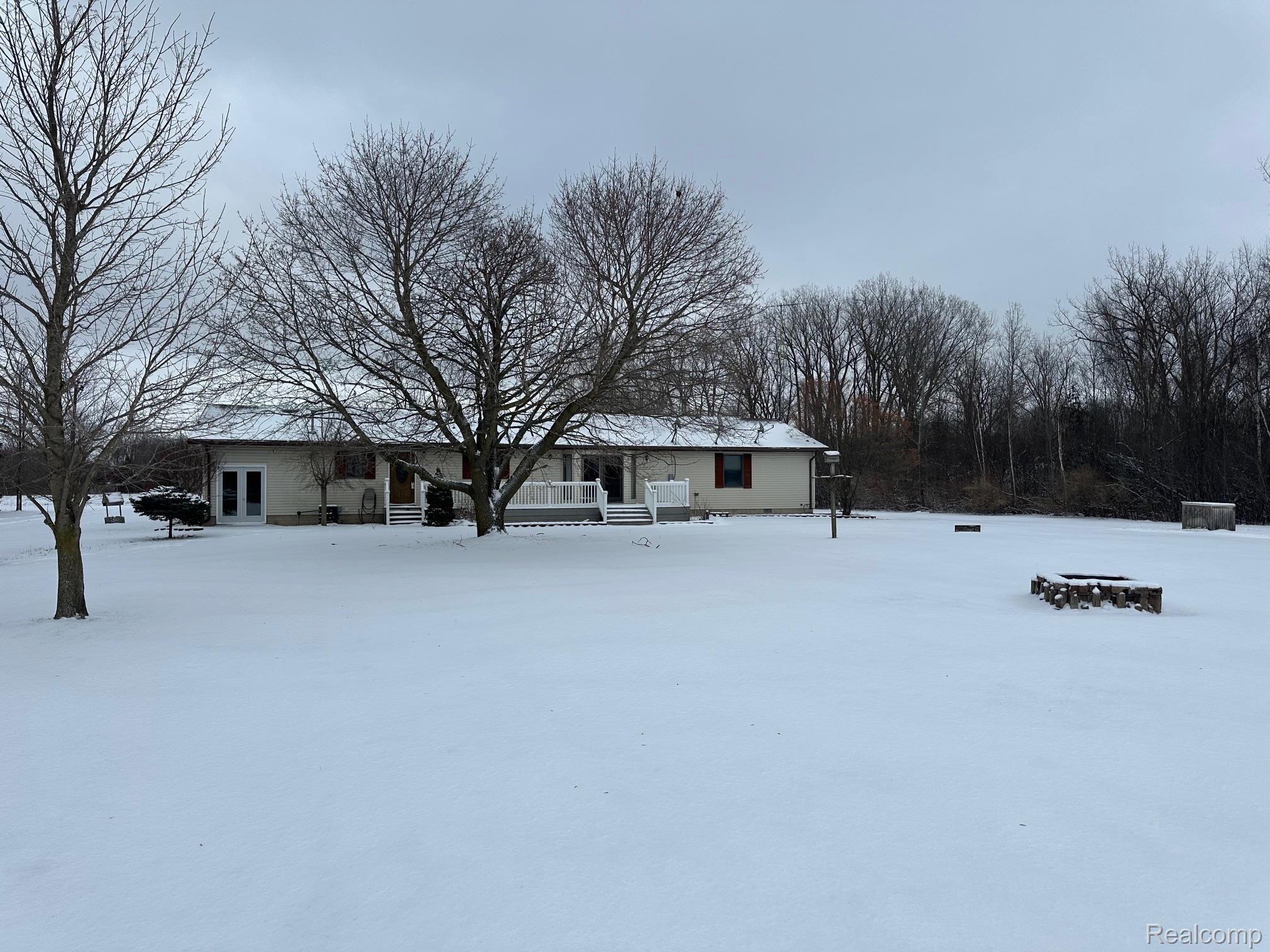3803 Warner Road Cass City, MI 48726 - Photo 75 of 85 Yard covered in snow with a wooden deck