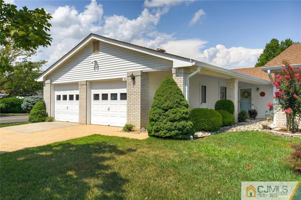 781 A Risley Road Monroe Township, NJ 08831 - Photo 1 of 21 a view of a house with a big yard and potted plants