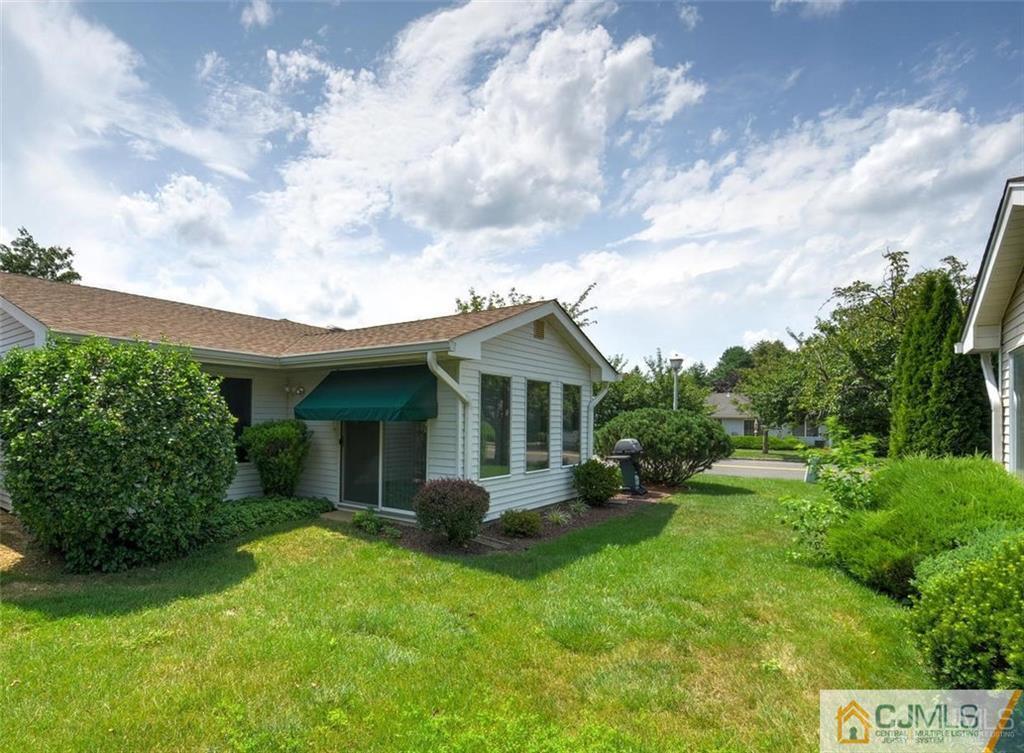 781 A Risley Road Monroe Township, NJ 08831 - Photo 18 of 21 a view of a house with yard and a garden
