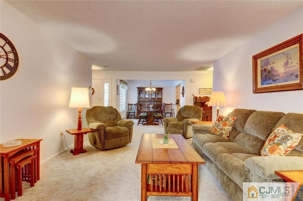 781 A Risley Road Monroe Township, NJ 08831 - Photo 5 of 21 a living room with furniture and a window