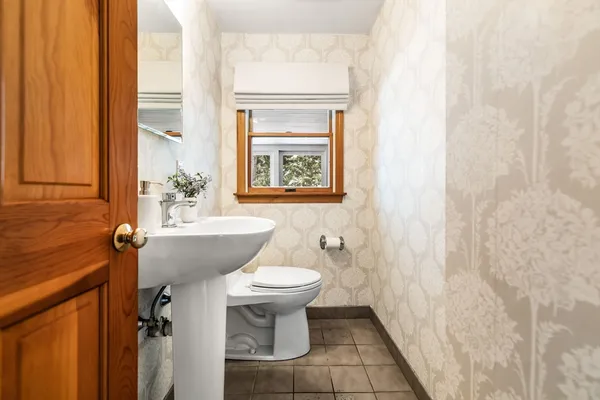 a bathroom with a sink and toilet