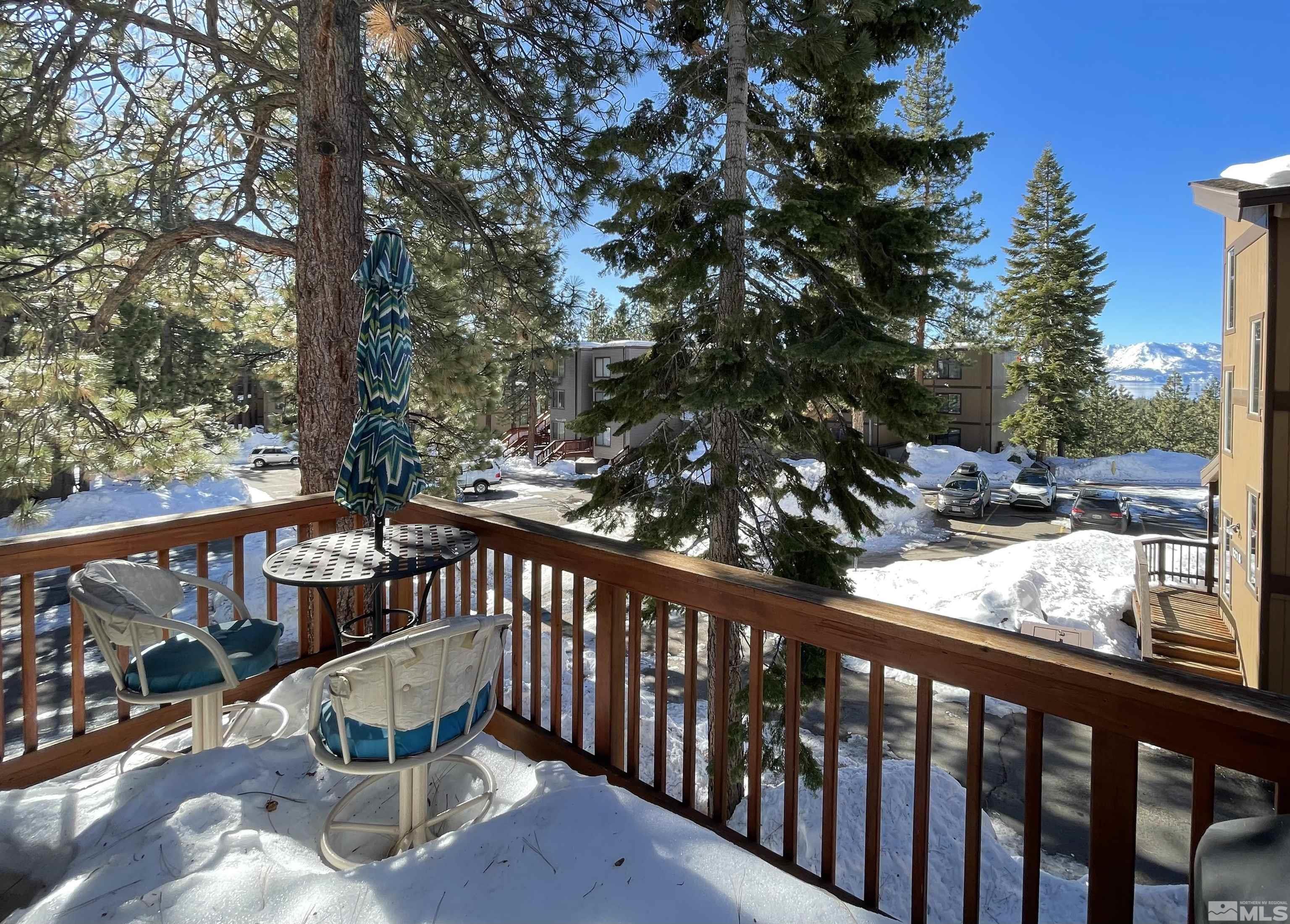 126 Spooner Lane, Unit B Stateline, NV 89449 - Photo 23 of 37 a view of a two chair in the balcony