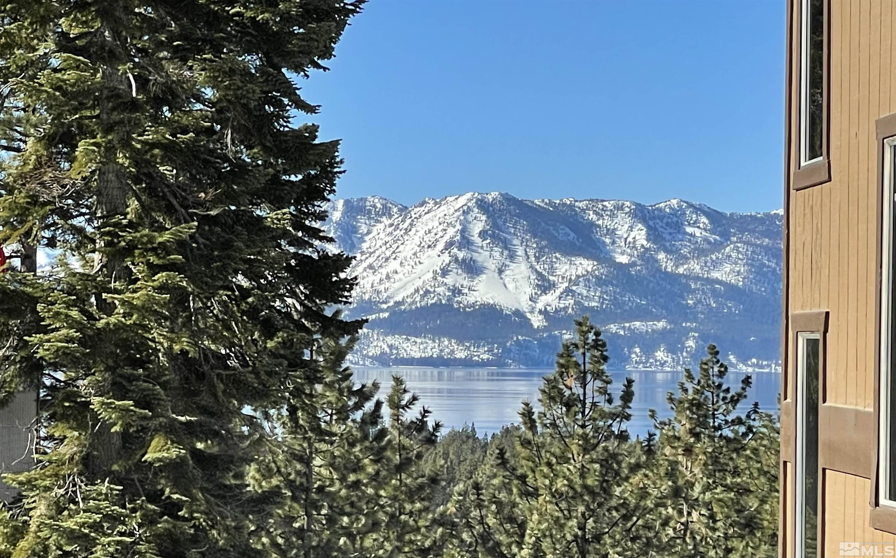 126 Spooner Lane, Unit B Stateline, NV 89449 - Photo 24 of 37 a view of a building with a tree