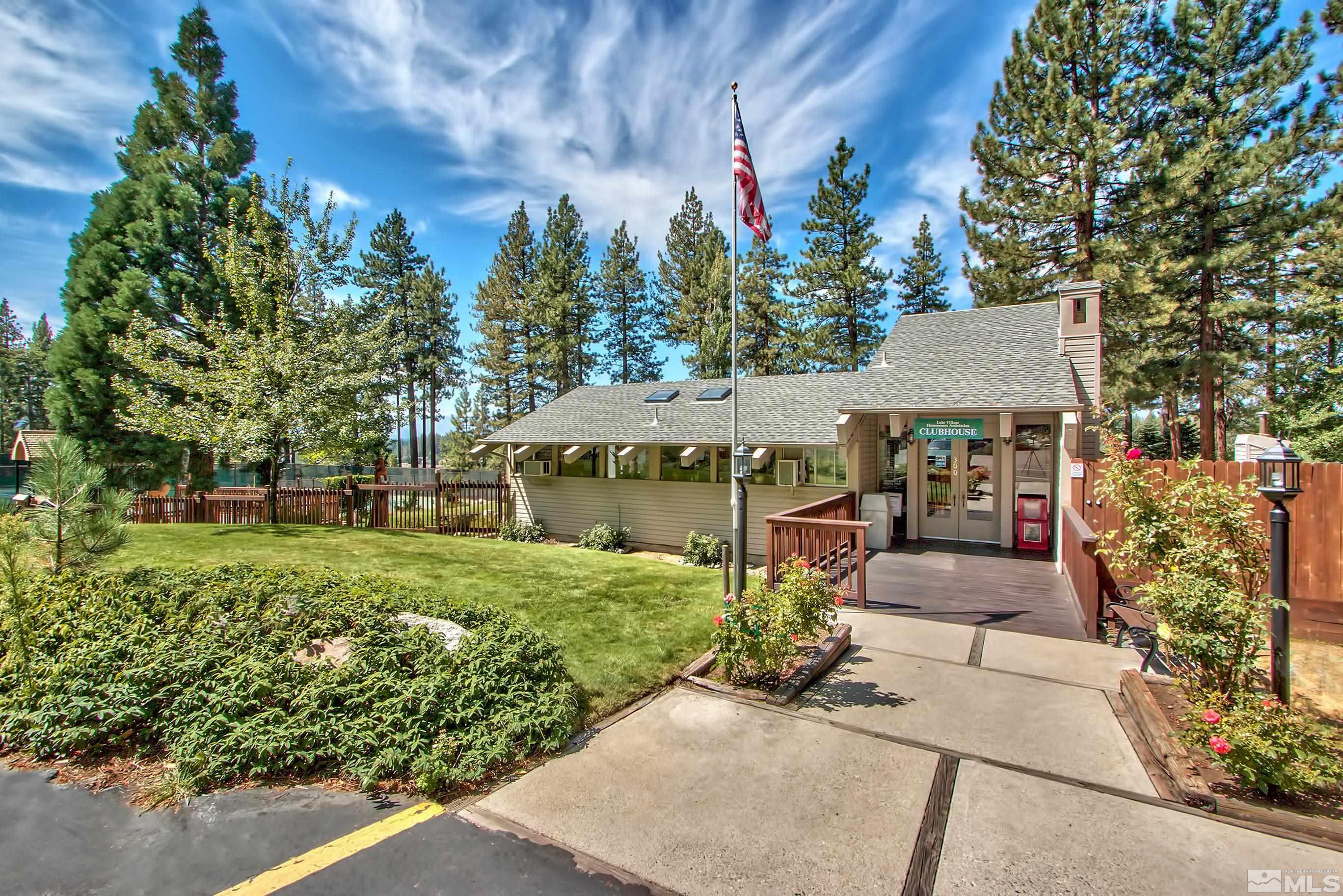 126 Spooner Lane, Unit B Stateline, NV 89449 - Photo 26 of 37 front view of a house with a yard