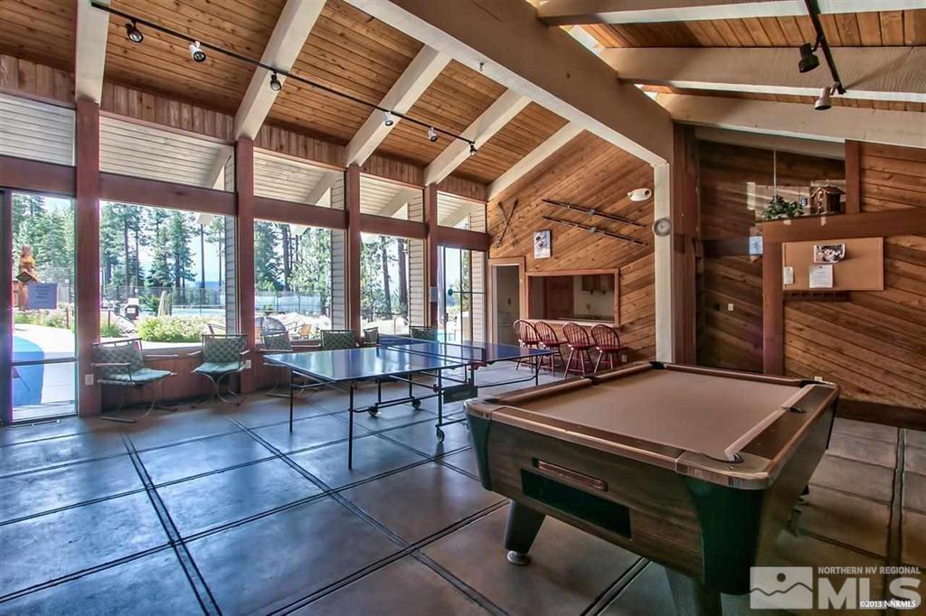 126 Spooner Lane, Unit B Stateline, NV 89449 - Photo 34 of 37 a room with furniture and a table