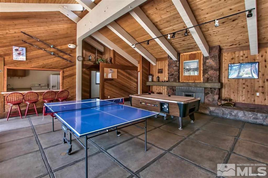126 Spooner Lane, Unit B Stateline, NV 89449 - Photo 35 of 37 a view of a tables and chairs in the patio