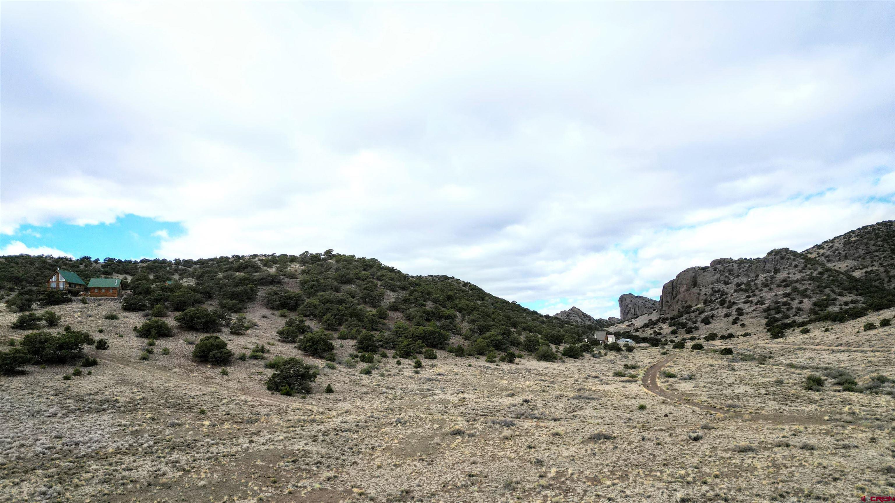 17 Ghost Mine Ranch Del Norte, CO 81132 - Photo 20 of 33 a view of a dry field covered with snow