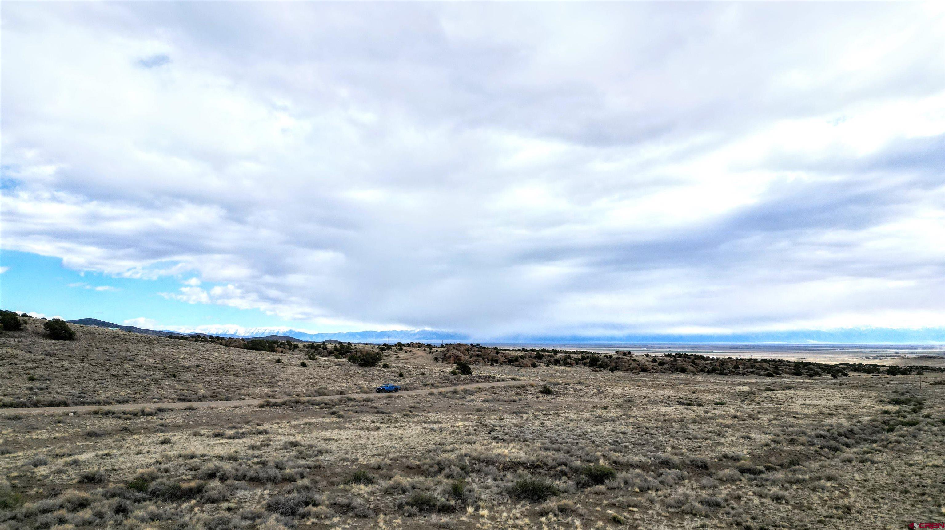 17 Ghost Mine Ranch Del Norte, CO 81132 - Photo 23 of 33 a view of a lake and mountain in back