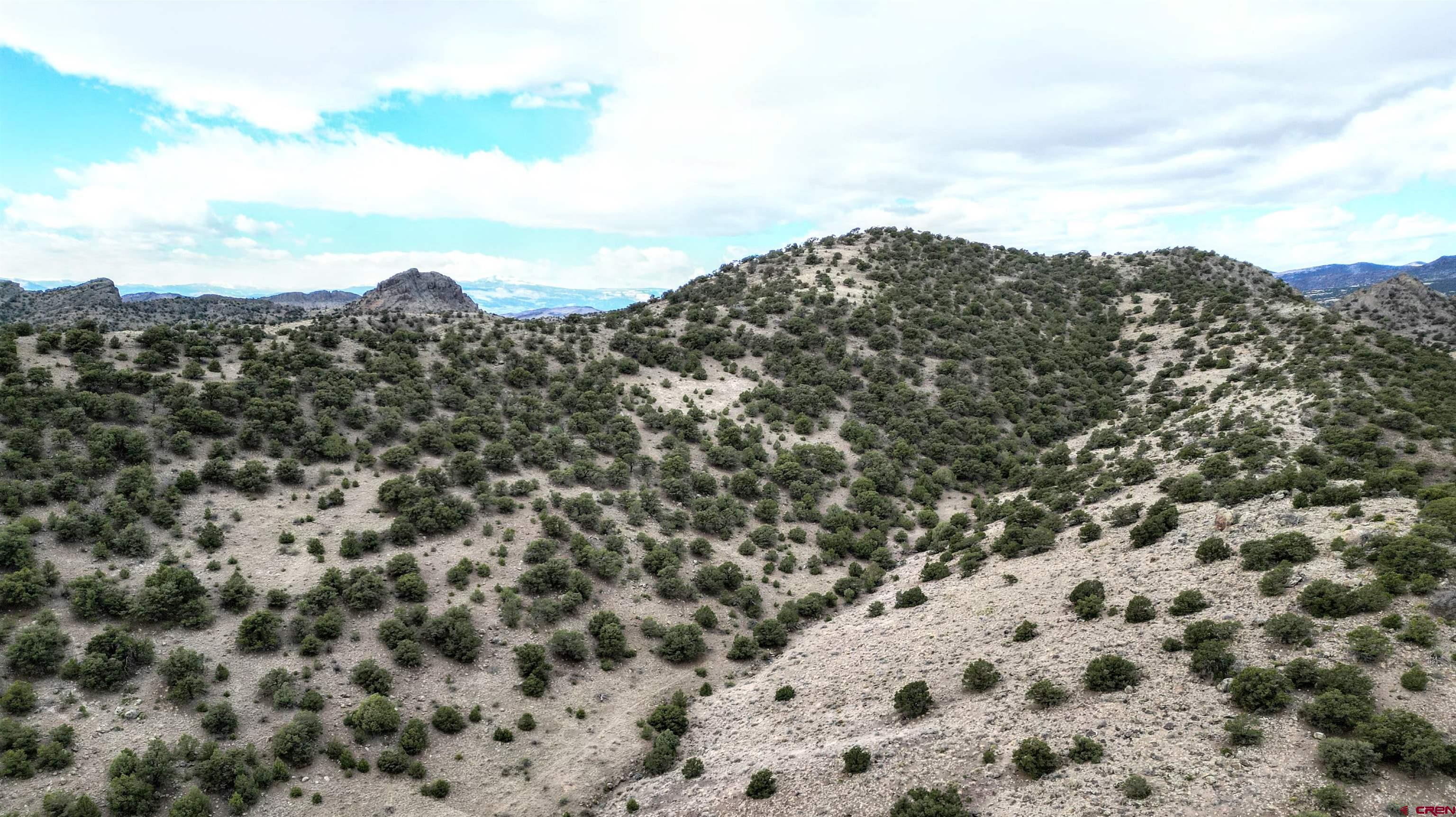 17 Ghost Mine Ranch Del Norte, CO 81132 - Photo 10 of 33 a view of a large building with mountain view