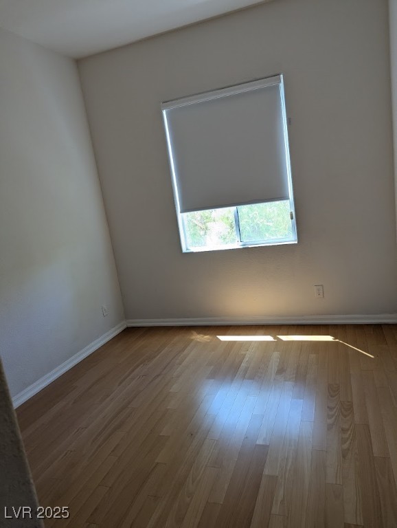 4777 Crakow Court Las Vegas, NV 89147 - Photo 13 of 49 Empty room featuring light wood finished floors