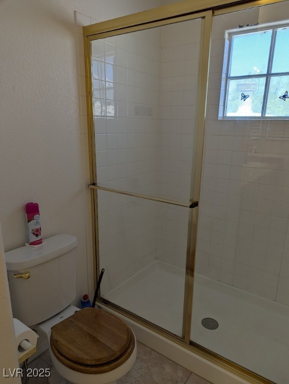 4777 Crakow Court Las Vegas, NV 89147 - Photo 16 of 49 Full bathroom with a stall shower and a textured wall