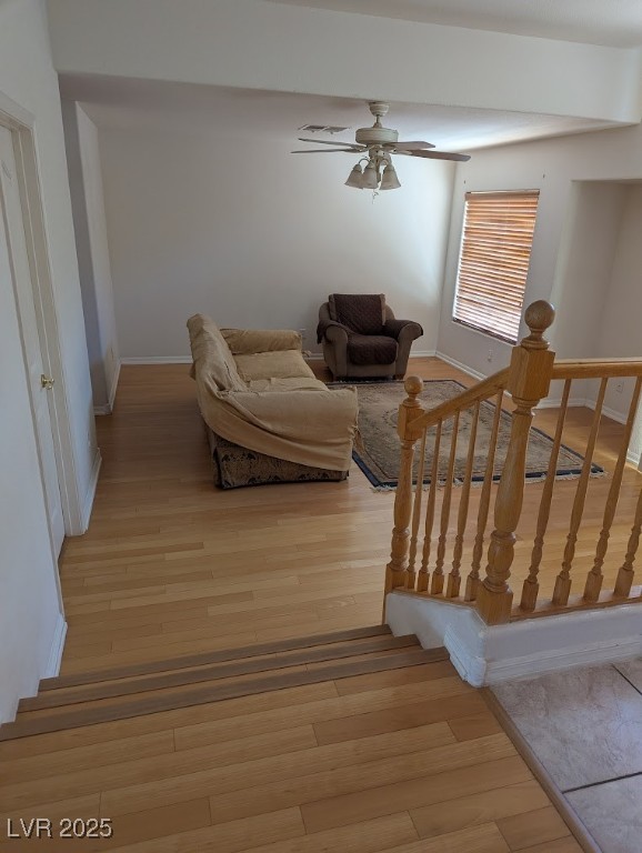 4777 Crakow Court Las Vegas, NV 89147 - Photo 30 of 49 Stairs featuring wood finished floors and a ceiling fan