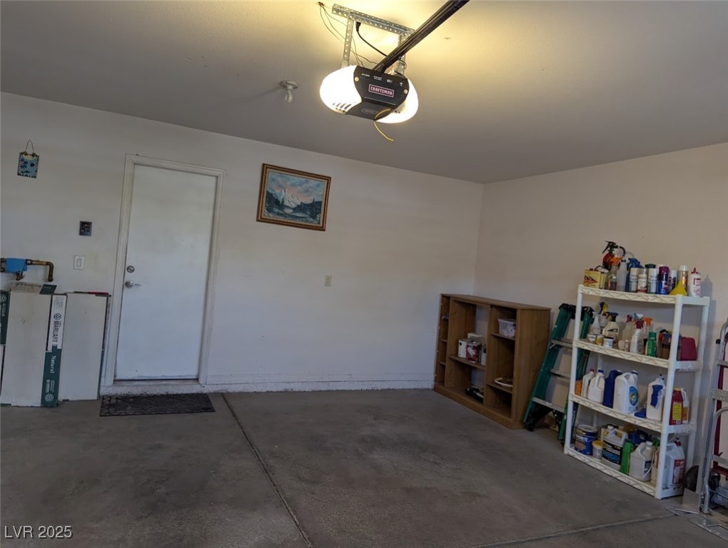 4777 Crakow Court Las Vegas, NV 89147 - Photo 35 of 49 Garage with a garage door opener