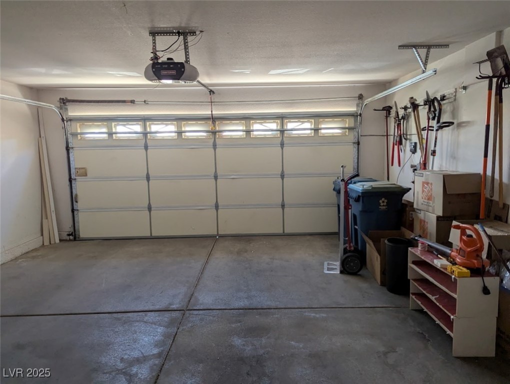 4777 Crakow Court Las Vegas, NV 89147 - Photo 38 of 49 Garage with a garage door opener