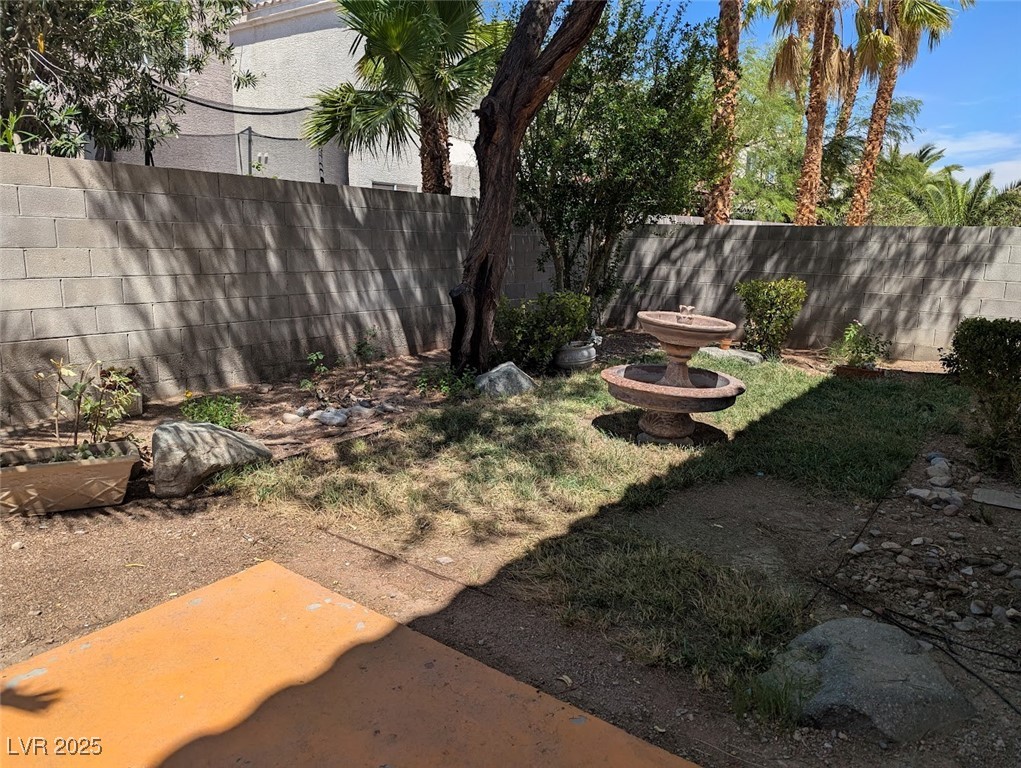4777 Crakow Court Las Vegas, NV 89147 - Photo 5 of 49 View of yard with a patio