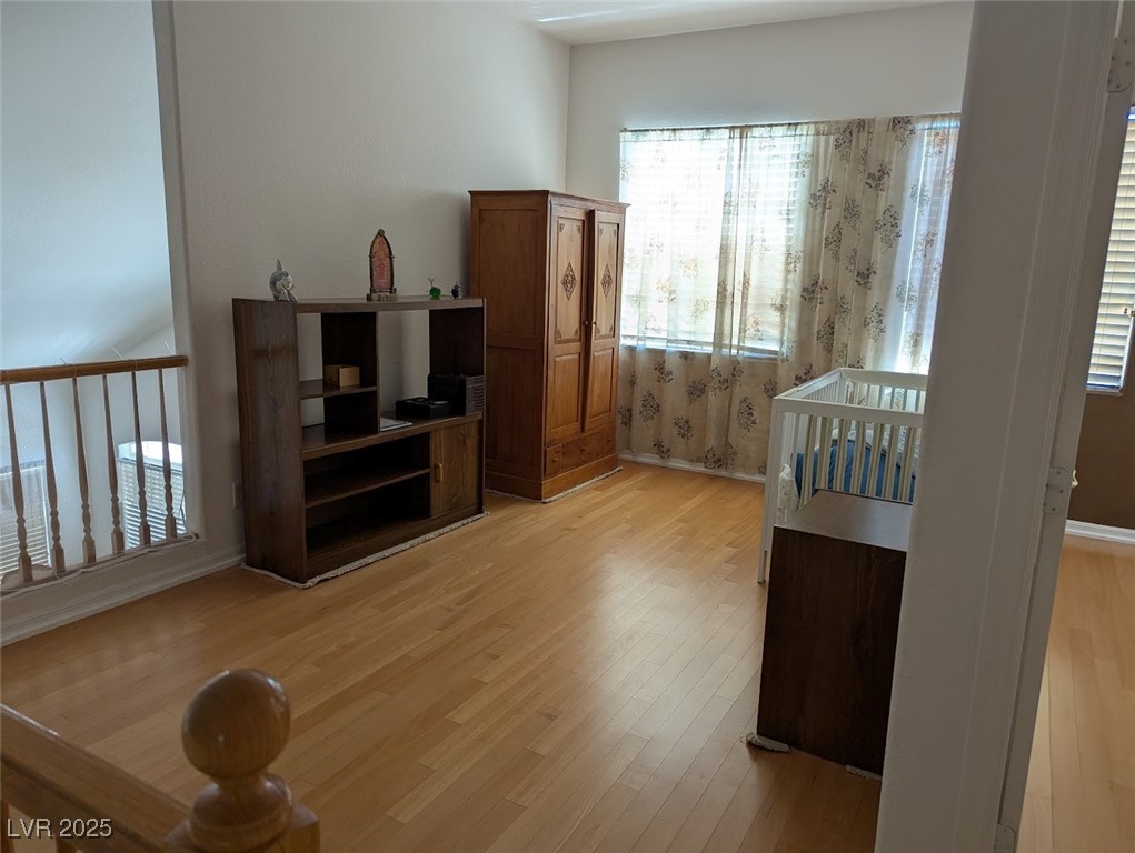 4777 Crakow Court Las Vegas, NV 89147 - Photo 7 of 49 Bedroom with light wood finished floors