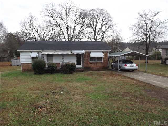 804 Cross Link Road Raleigh, NC 27610 - Photo 1 of 8 a car parked in front of a house