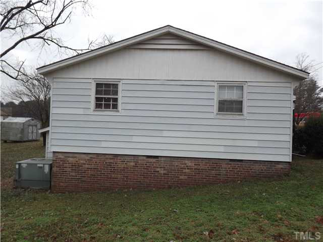 804 Cross Link Road Raleigh, NC 27610 - Photo 7 of 8 a front view of a house with a yard
