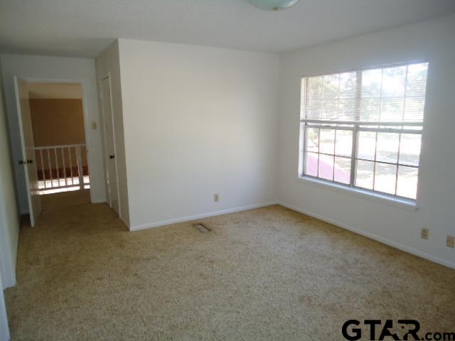 16994-c R 223 C R 223 Arp, TX 75750 - Photo 21 of 38 an empty room with a window