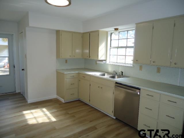16994-c R 223 C R 223 Arp, TX 75750 - Photo 22 of 38 a kitchen with a sink cabinets appliances and a window